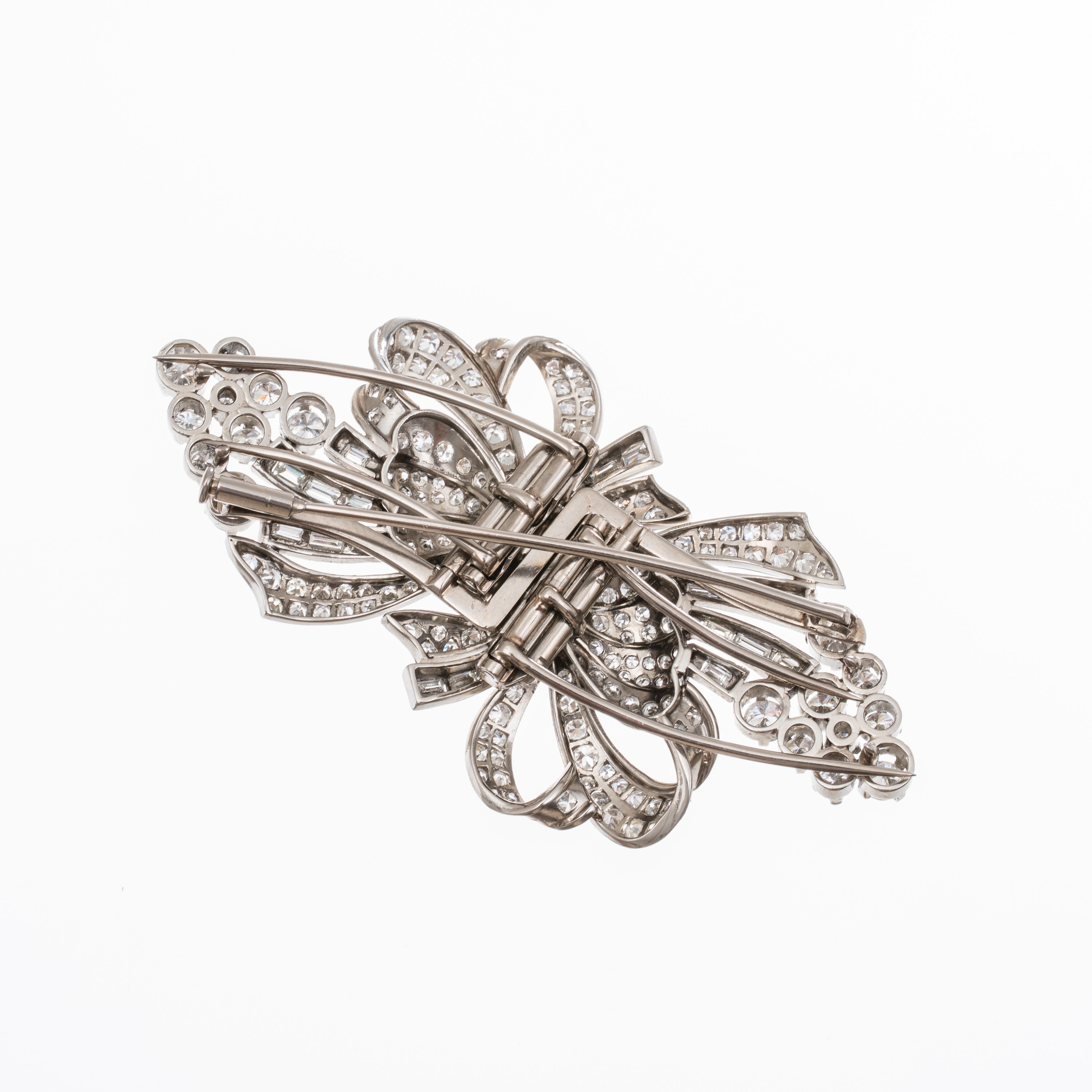 SPILLA A DOPPIA CLIP IN PLATINO CON DUE DIAMANTI TAGLIO BRILLANTE E BAGUETTES