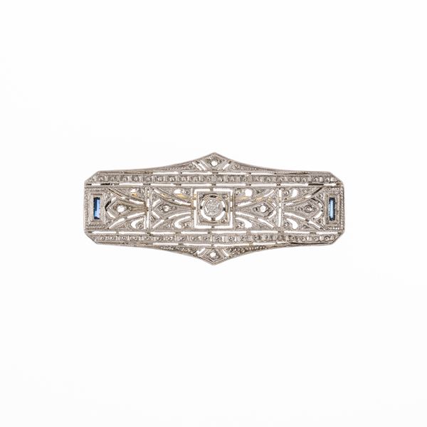 SPILLA IN ORO BIANCO 18 KT E DIAMANTI 