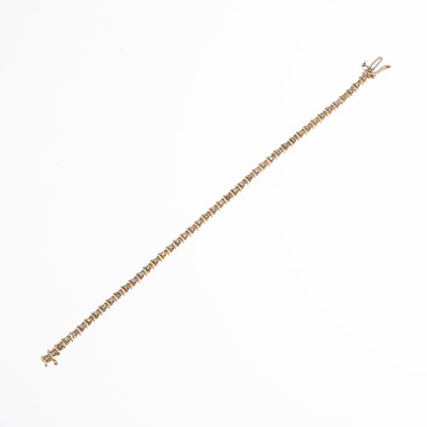 BRACCIALE TENNIS IN ORO GIALLO 18 KT E DIAMANTI TAGLIO BRILLANTE