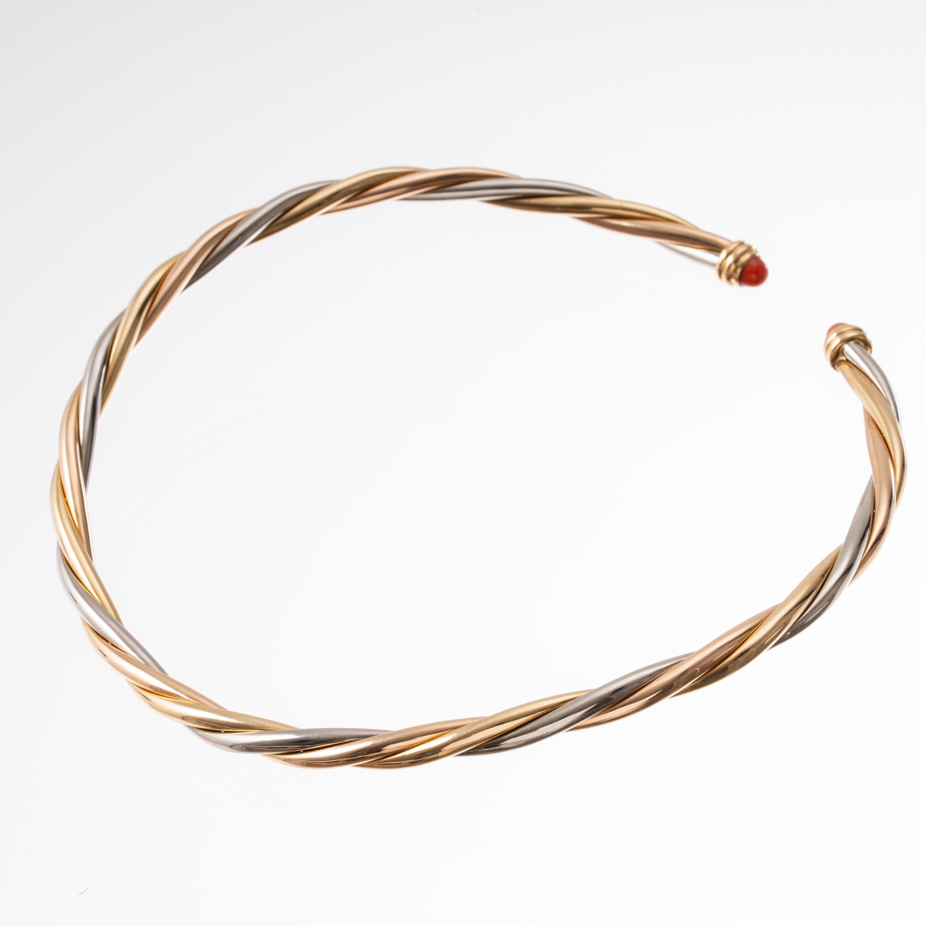 CARTIER - GIROCOLLO IN TRE ORI 18 KT E DUE CORALLI CABOCHON