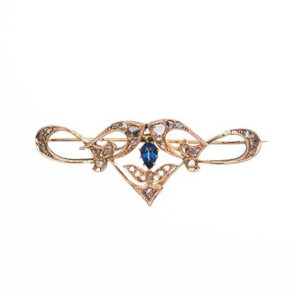 18 KT YELLOW GOLD BOW BROOCH WITH TEARDROP SAPPHIRE