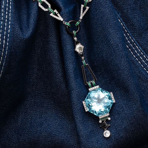 PLATINUM NECKLACE IN DIAMONDS, EMERALDS, ONYX AND AQUAMARINE