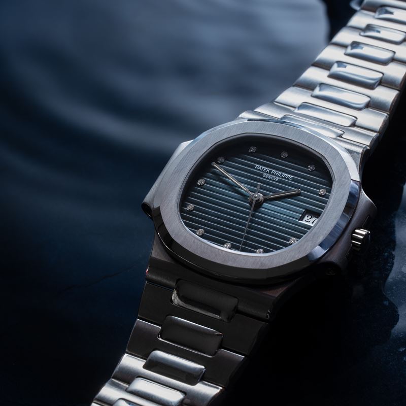 PATEK PHILIPPE - NAUTILUS OROLOGIO SOLO TEMPO A CARICA AUTOMATICA IN ACCIAIO CON QUADRANTE BLU SI...