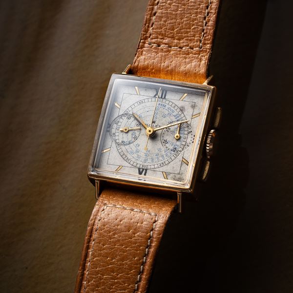 ROLEX - ROLEX - CIOCCOLATINO CHRONOGRAPH 18KT YELLOW GOLD MANUAL WINDING CHRONOGRAPH WITH WHITE DIAL, BLUE TELEMETRIC SCALE, BLACK ROMAN NUMERALS AND MIRROR INDEXES