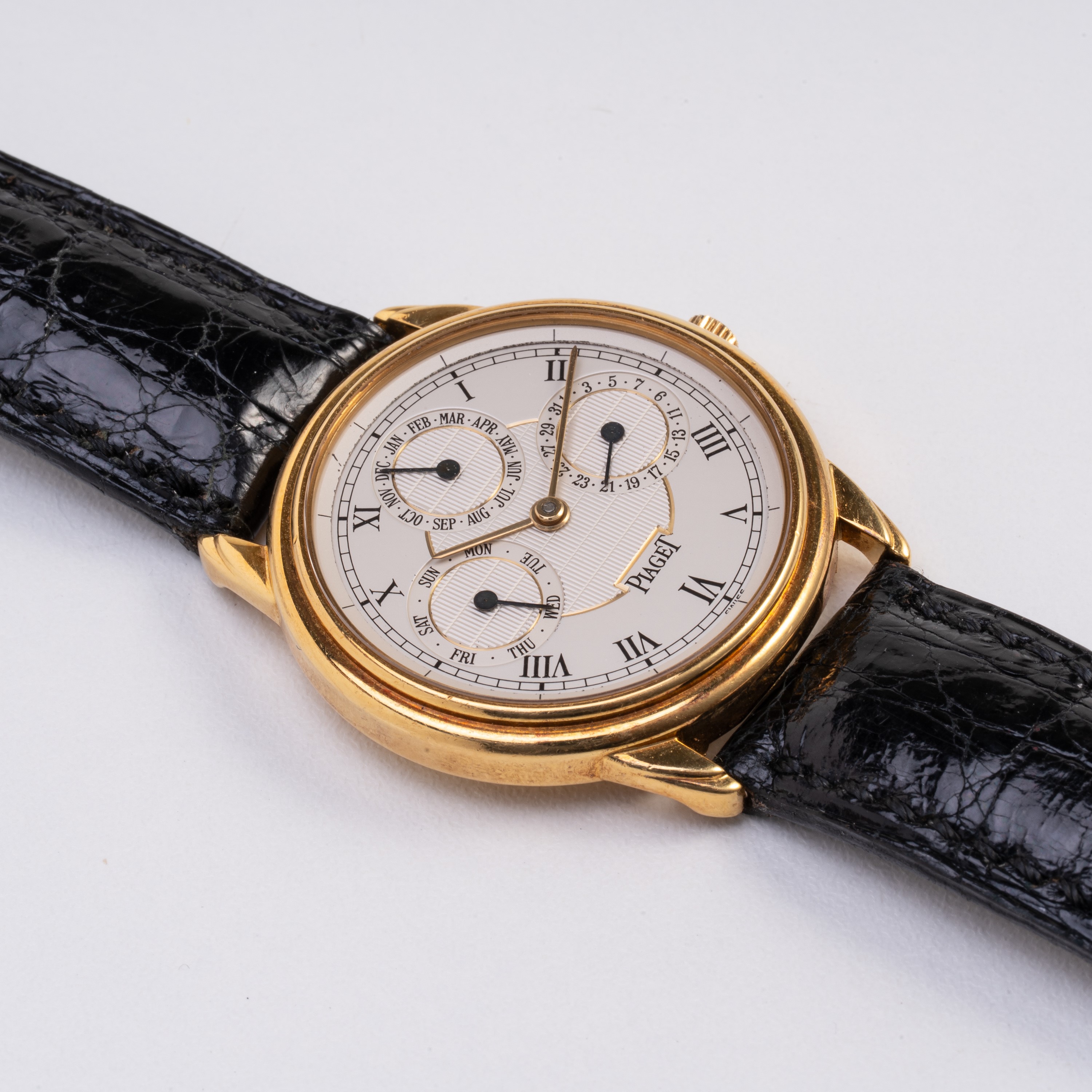PIAGET - TRIPLE CALENDAR TRIPLO CALENDARIO A CARICA AUTOMATICA IN ORO GIALLO 18KT CON QUADRANTE B...