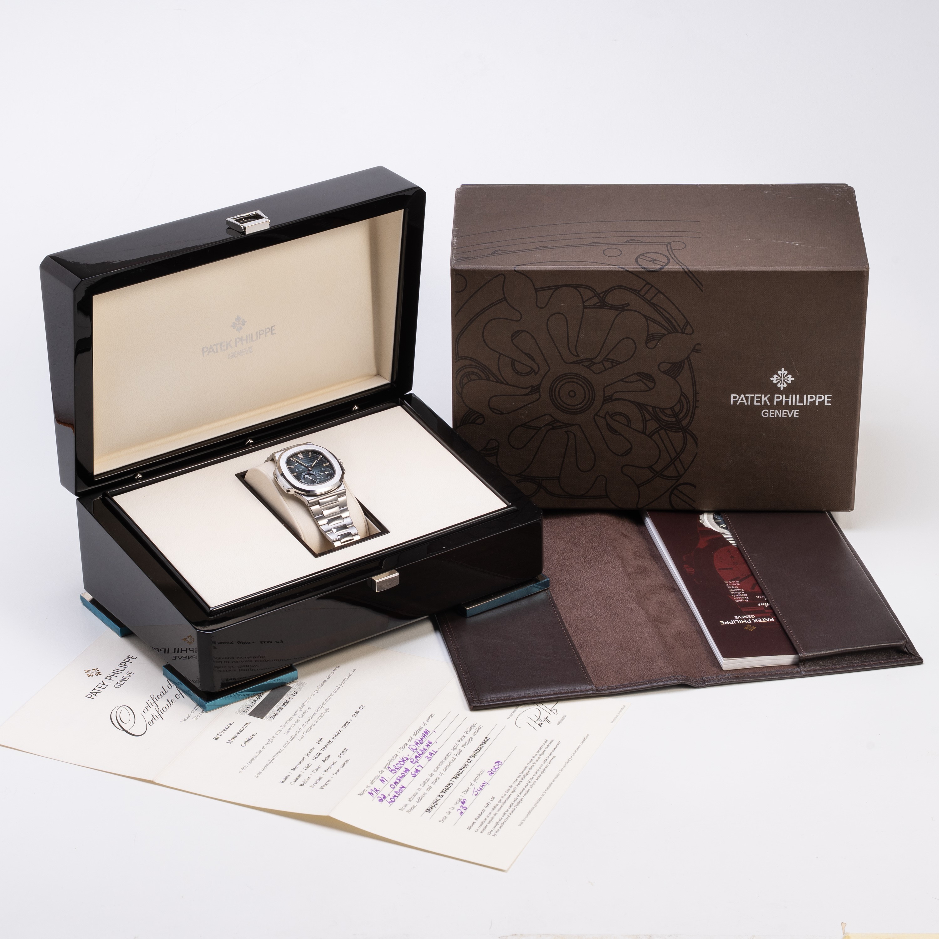 PATEK PHILIPE - NAUTILUS OROLOGIO SOLO TEMPO A CARICA AUTOMATICA IN ACCIAIO CON RISERVA DI CARICA...