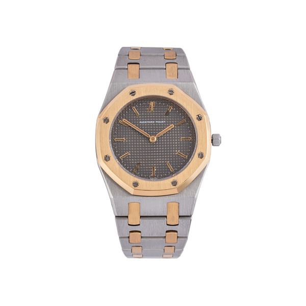 AUDEMARS PIGUET - AUDEMARS PIGUET - ROYAL OAK QUARTZ TIME-ONLY WATCH IN STEEL AND 18KT YELLOW GOLD WITH GRAY TAPISSERIE DIAL