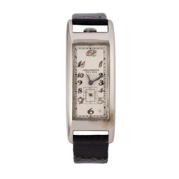 MOVADO - POLYPLAN MANUAL WINDING TIME ONLY WATCH IN 18KT WHITE GOLD WITH ‘CURVEX’ CASE, WHITE DIAL WITH BREGUET INDEXES AND SMALL SECONDS AT SIX O'CLOCK.