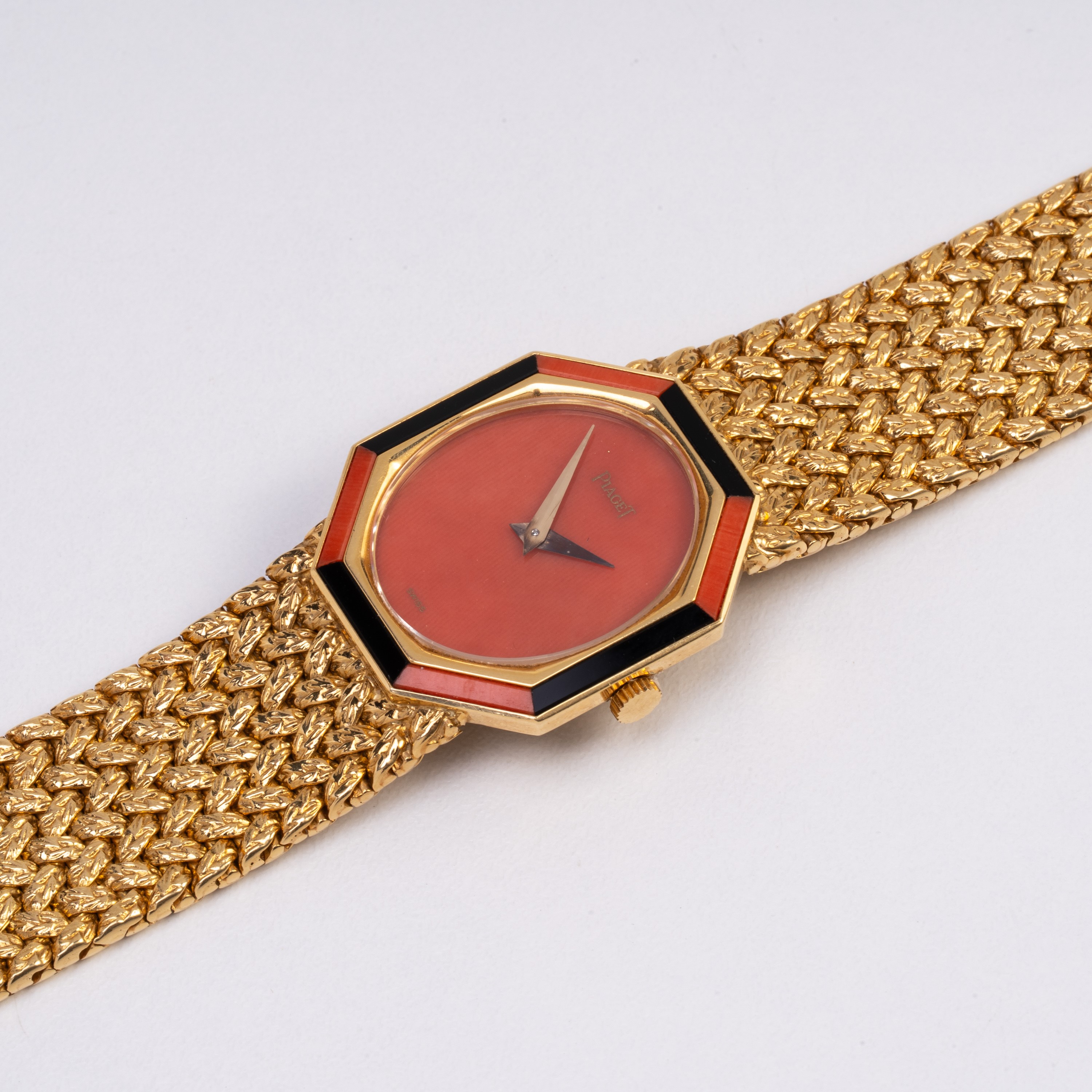 PIAGET OROLOGIO SOLO TEMPO A CARICA MANUALE IN ORO GIALLO 18KT, CON QUADRANTE IN CORALLO E BRACCI...