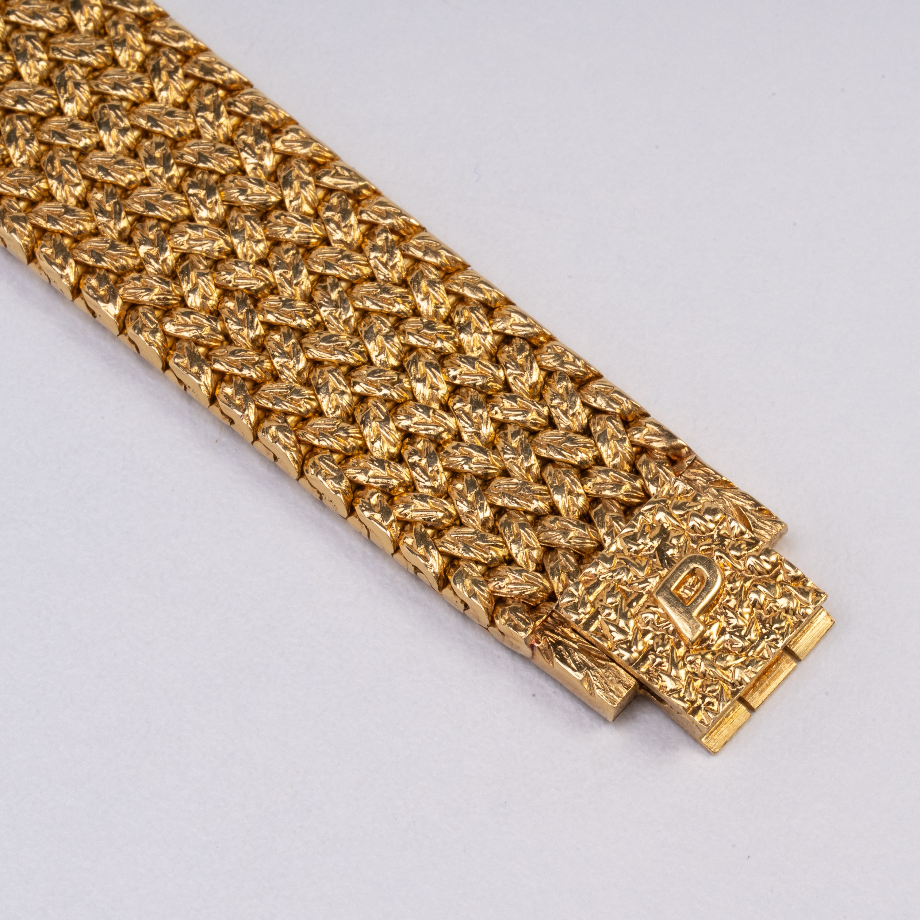 PIAGET OROLOGIO SOLO TEMPO A CARICA MANUALE IN ORO GIALLO 18KT, CON QUADRANTE IN CORALLO E BRACCI...