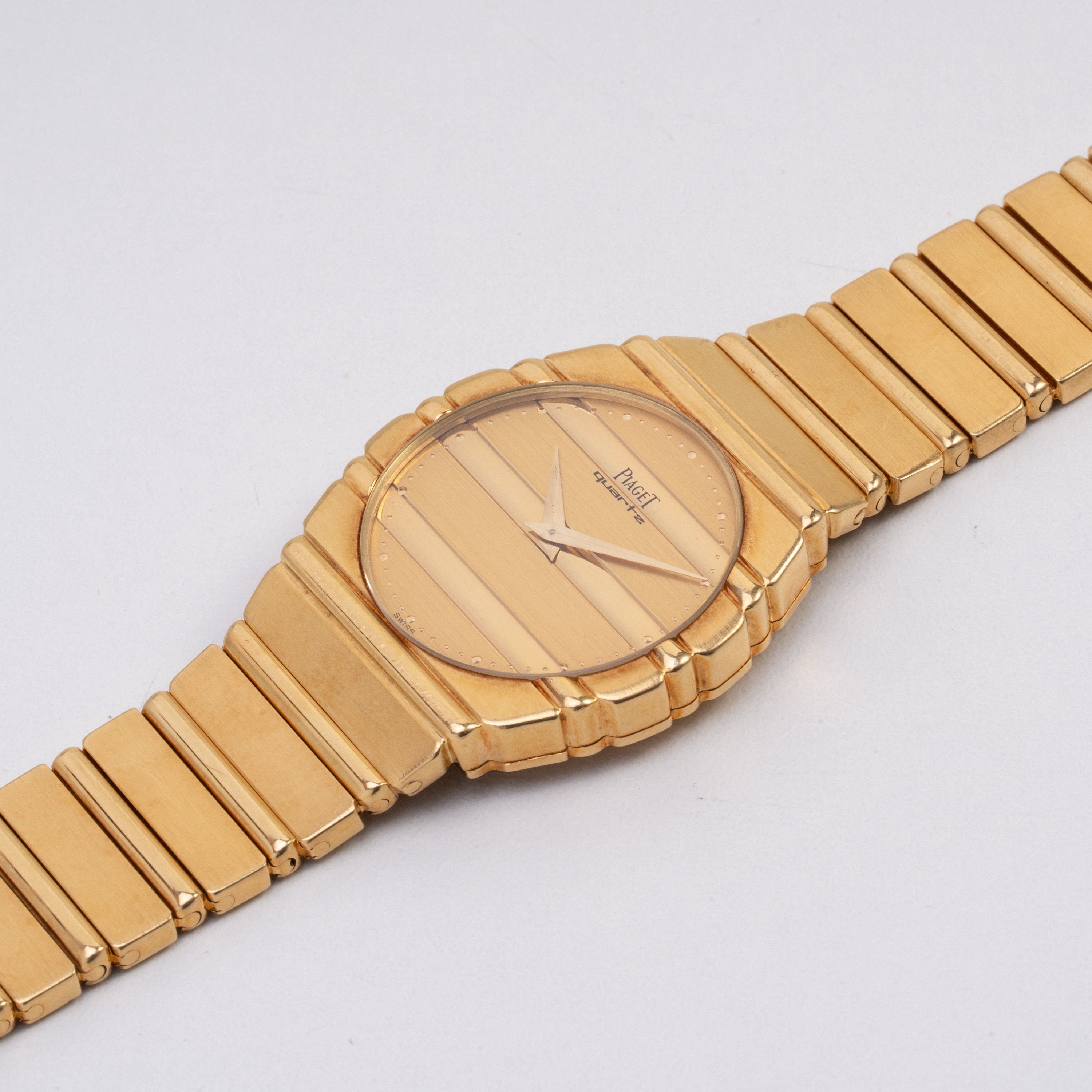 PIAGET - POLO OROLOGIO SOLO TEMPO AL QUARZO IN ORO GIALLO 18KT CON BRACCIALE INTEGRATO IN ORO GIA...