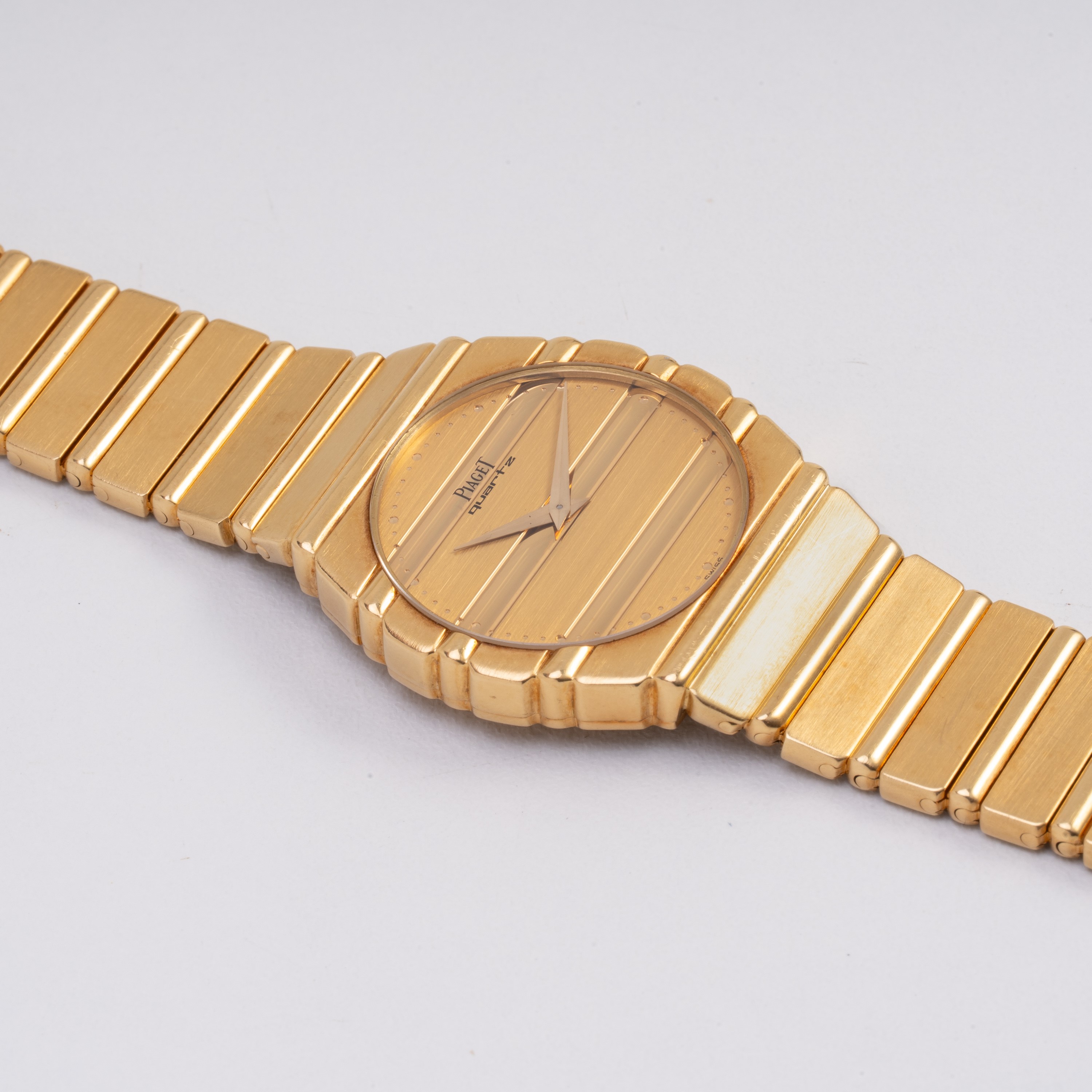 PIAGET - POLO OROLOGIO SOLO TEMPO AL QUARZO IN ORO GIALLO 18KT CON BRACCIALE INTEGRATO IN ORO GIA...