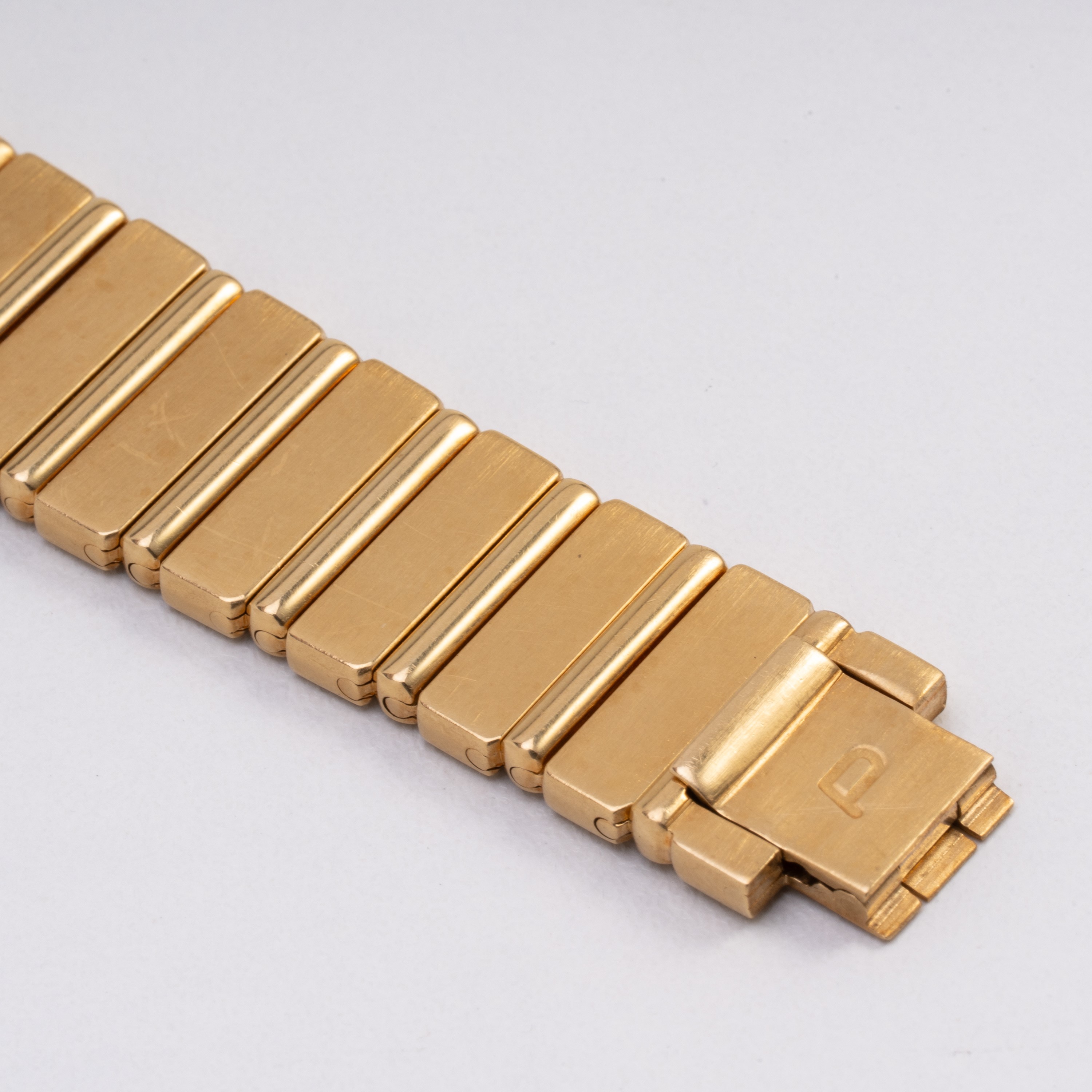 PIAGET - POLO OROLOGIO SOLO TEMPO AL QUARZO IN ORO GIALLO 18KT CON BRACCIALE INTEGRATO IN ORO GIA...