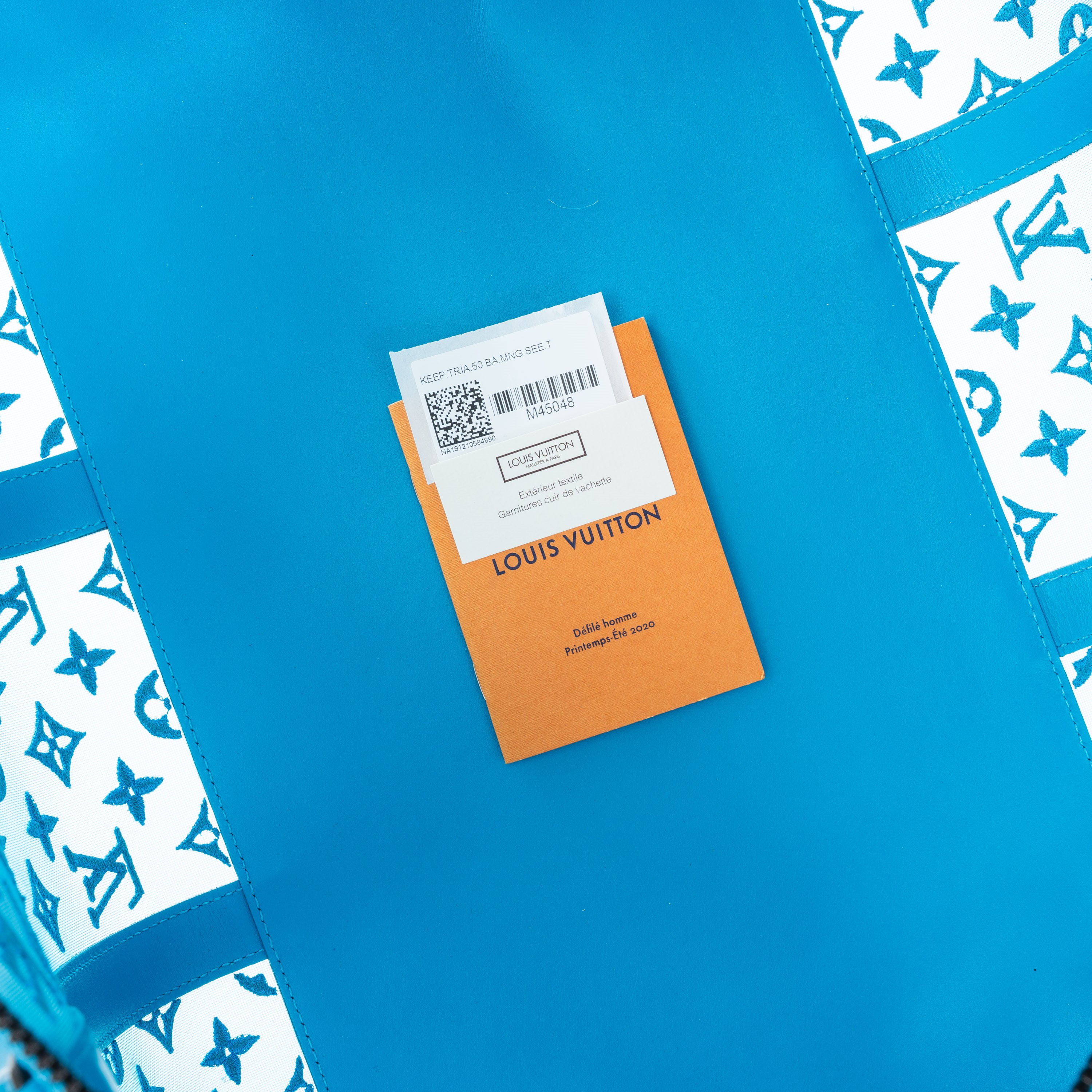 LOUIS VUITTON KEEPALL TRIANGLE BANDOULIERE 50 TURQUOISE MONOGRAMME SEE THROUGH