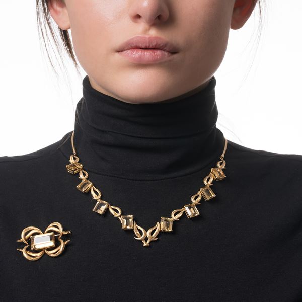 SPILLA E GIROCOLLO IN ORO GIALLO E QUARZI CITRINI