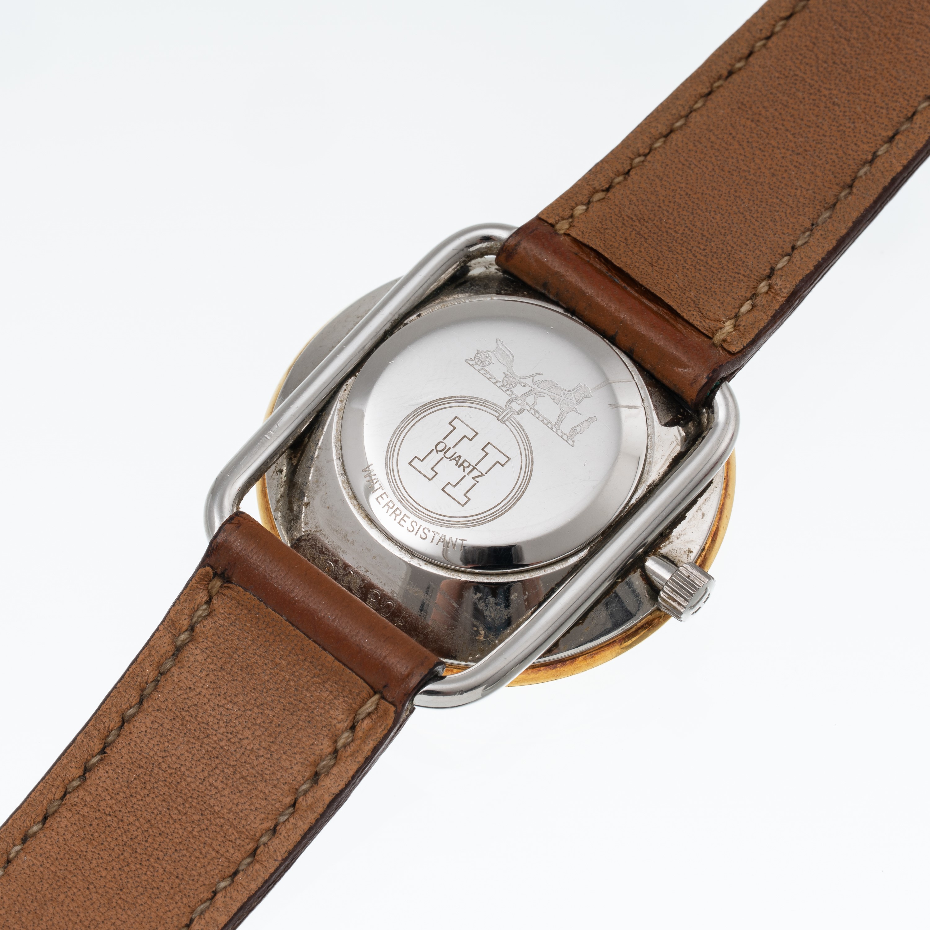 HERMES OROLOGIO SOLO TEMPO AL QUARZO IN ACCIAIO CON QUADRANTE CHAMPAGNE, GHIERA DORATA E DATARIO ...