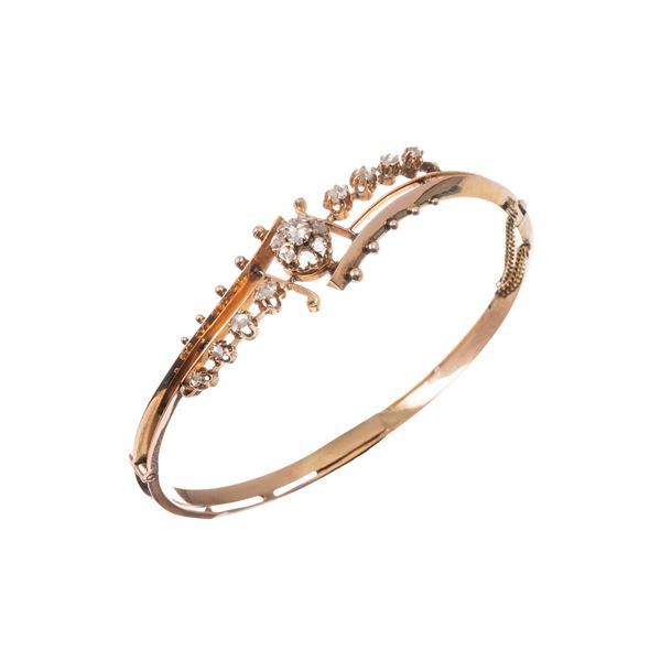 BRACCIALE IN ORO 18 KT CON ROSETTE E DIAMANTE