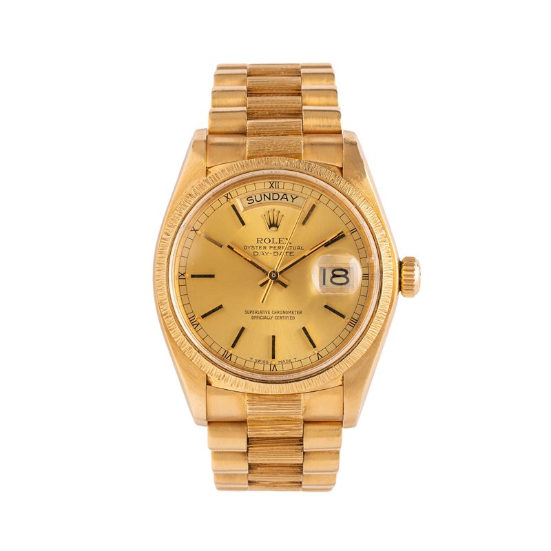 ROLEX - DAY DATE OROLOGIO DAY DATE IN ORO GIALLO 18 KT CON QUADRANTE CHAMPAGNE, GHIERA CON LAVORA...
